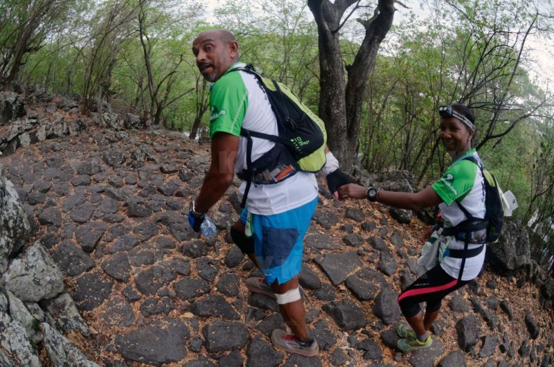 Les traileurs de la Mascareignes, course du Grand Raid, sur le chemin des Anglais qui monte jusqu'au Colorado, derniere etape avant l'arrivee. Mascarene trailers, race of the Grand Raid, on the "path of the English" who goes up to Colorado, last stage before the arrival.