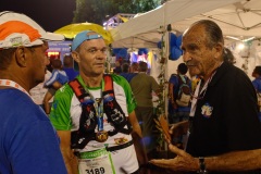 Les traileurs de la Mascareignes, course du Grand Raid, a l'arrivee au stade de la Redoute, Saint-Denis. A droite, le president de l'association Grand Raid, Robert Chicaud. Mascarene trailers, race of the Grand Raid, at the arrival, la Redoute stadium, Saint-Denis town. On the right, the president of the Grand Raid association, Robert Chicaud.