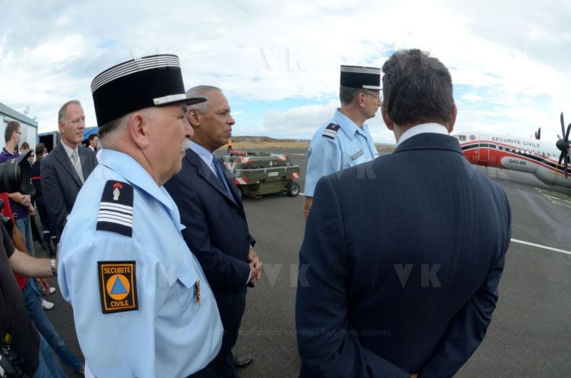 National capacity Securite Civile - Fight against forest fires at Pierrefonds Airport..Presentation of the plan to restore forests destroyed and the material (Pelicandrome, Dash8, vehicles), with Mr. Victorin Lurel, french Minister of ultramarine, and local authorities.